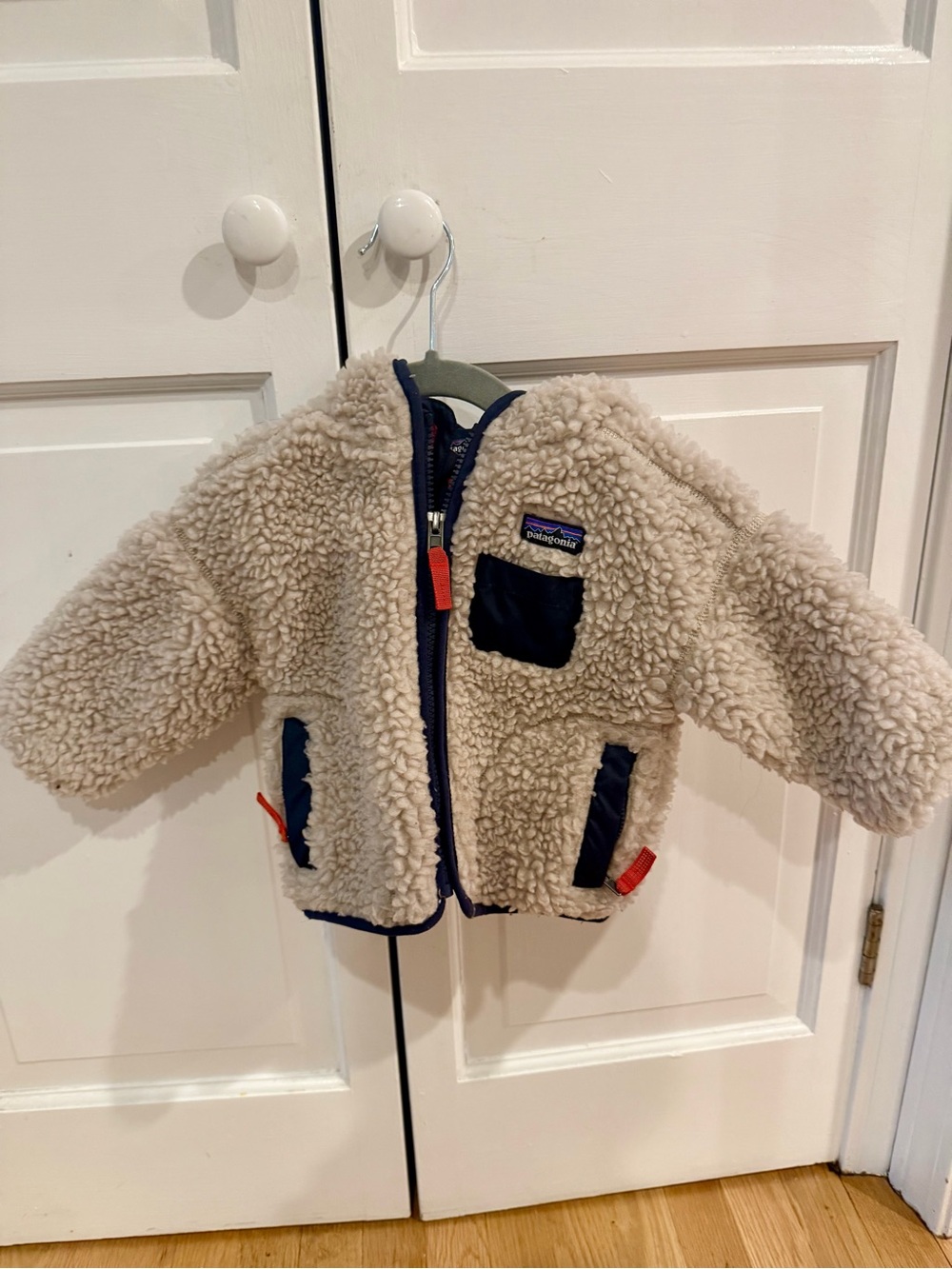 Patagonia Kids Cream Sherpa Jacket with Navy Trim and Red Accents